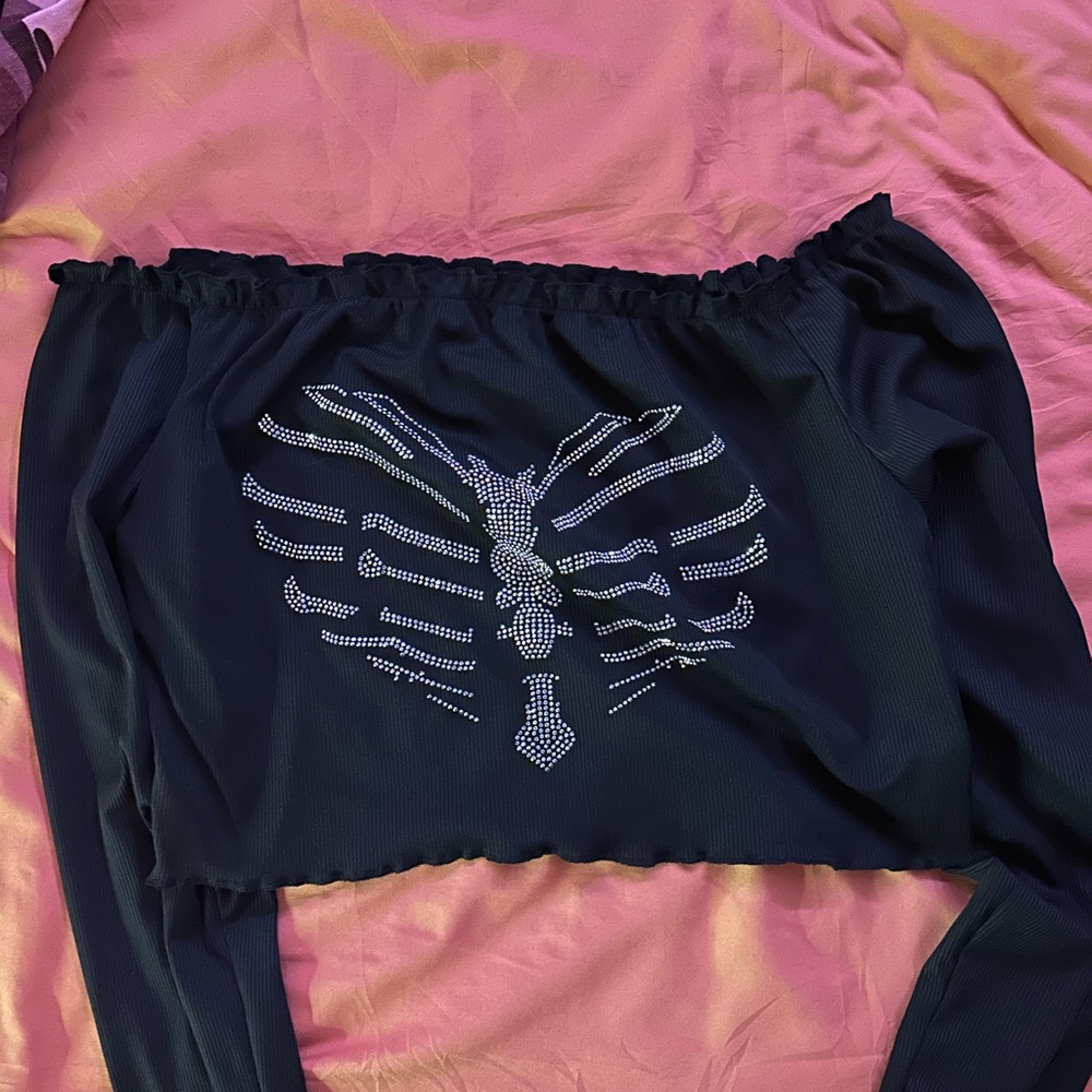 Black Off-Shoulder Top with Skeleton Design